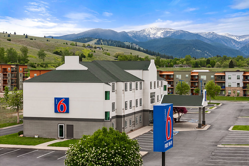 Aerial view of Motel 6 Missoula with scenic Montana mountain backdrop