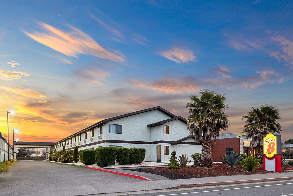 Super 8 Arcata exterior at sunset showcasing the hotel's welcoming facade.